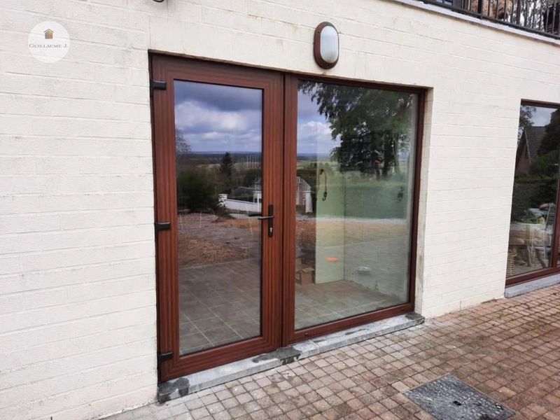 Porte-fenêtre double en bois – Guillaume Menuiserie
