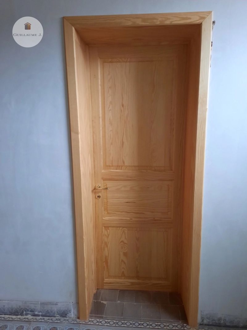 Porte intérieure en bois à panneaux – Guillaume Menuiserie