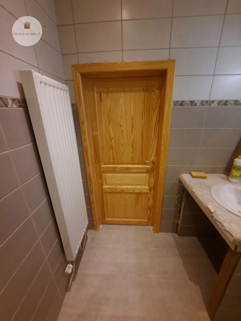 Porte intérieure en bois à panneaux – Guillaume Menuiserie